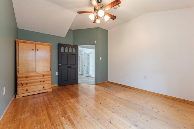 719 Shaver St, Pasadena, TX 77506 - empty room featuring lofted ceiling, a ceiling fan, and light wood-style floors