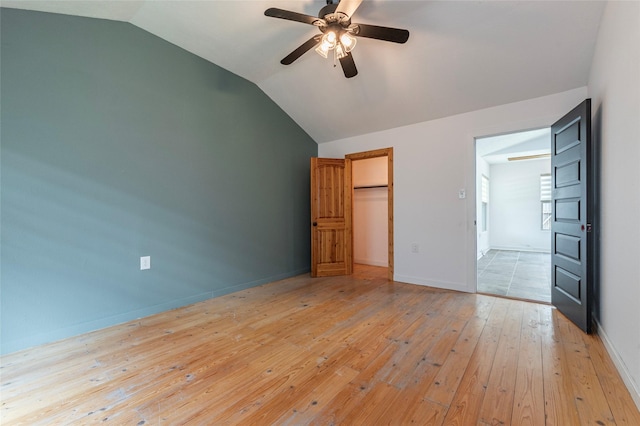 719 Shaver St, Pasadena, TX 77506 - unfurnished bedroom featuring lofted ceiling, light wood-style flooring, a ceiling fan, and a closet