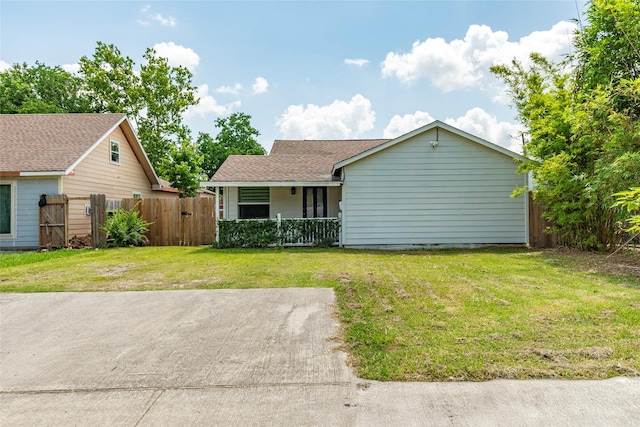 719 Shaver St, Pasadena, TX 77506 - view of front of property with a porch, roof with shingles, and a gate