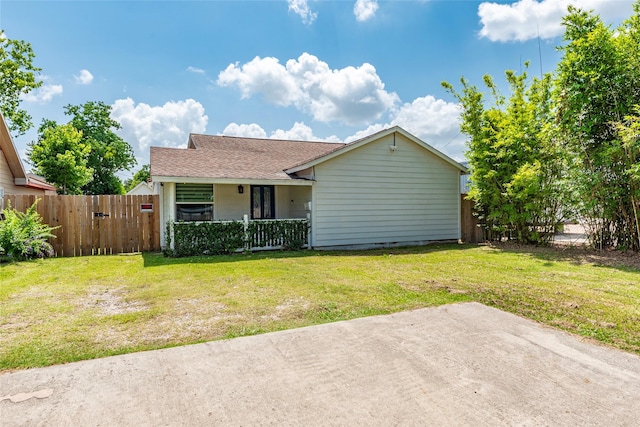 719 Shaver St, Pasadena, TX 77506 - view of front facade with covered porch, a shingled roof, and a gate
