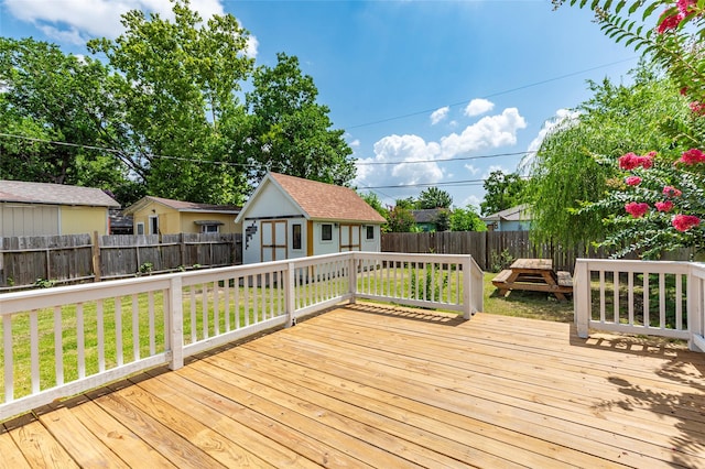 719 Shaver St, Pasadena, TX 77506 - deck with a fenced backyard and an outbuilding