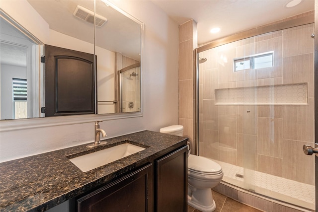 719 Shaver St, Pasadena, TX 77506 - full bath featuring healthy amount of natural light, a shower stall, vanity, and tile patterned floors