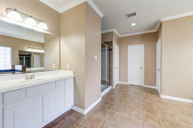 14410 Basalt Ln, Houston, TX 77077 - bathroom featuring vanity, a shower stall, ornamental molding, baseboards, and tile patterned floors
