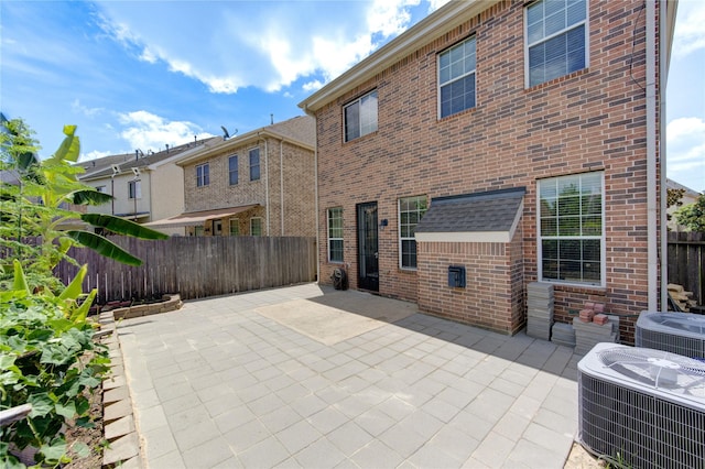 14410 Basalt Ln, Houston, TX 77077 - fenced backyard with cooling unit and a patio area