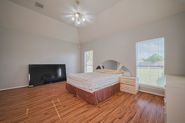 14723 Belterraza Dr, Houston, TX 77083 - bedroom featuring light wood-style flooring, baseboards, a ceiling fan, and lofted ceiling