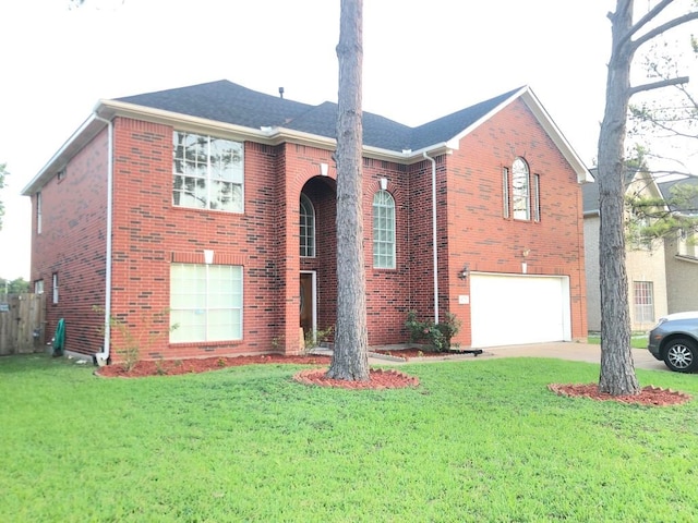 14723 Belterraza Dr, Houston, TX 77083 - traditional-style house with brick siding, an attached garage, a front yard, and driveway