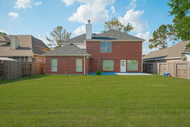 14723 Belterraza Dr, Houston, TX 77083 - back of property with brick siding, a chimney, a patio, and roof with shingles