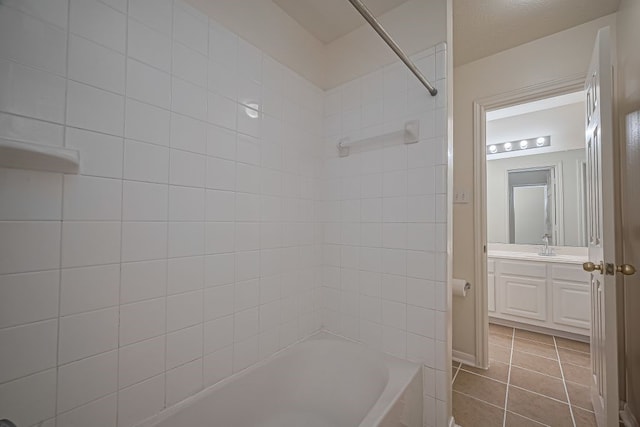 14723 Belterraza Dr, Houston, TX 77083 - full bath featuring vanity, shower / bathtub combination, and tile patterned floors