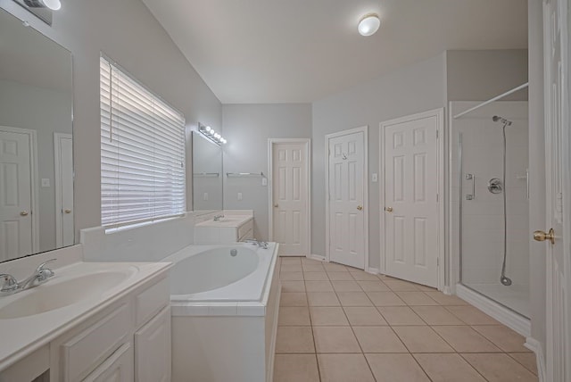 14723 Belterraza Dr, Houston, TX 77083 - bathroom featuring vanity, a stall shower, tile patterned flooring, and a bath