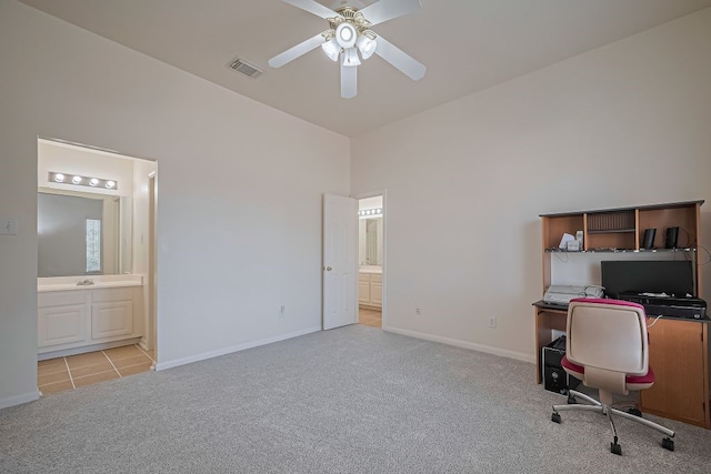 14723 Belterraza Dr, Houston, TX 77083 - unfurnished office featuring light colored carpet, a ceiling fan, baseboards, and a towering ceiling