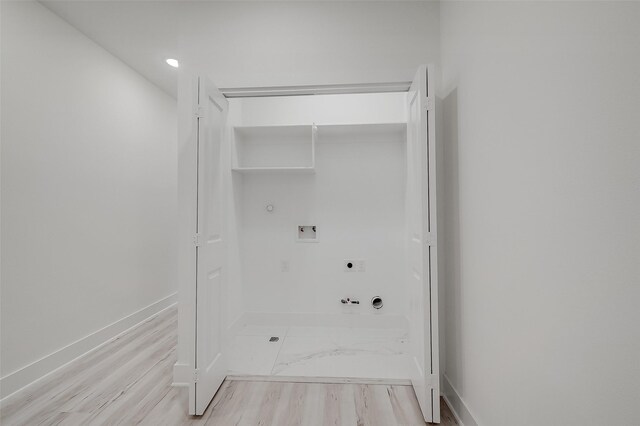 7002 Sidney St, Houston, TX 77021 - bathroom with baseboards and wood finished floors