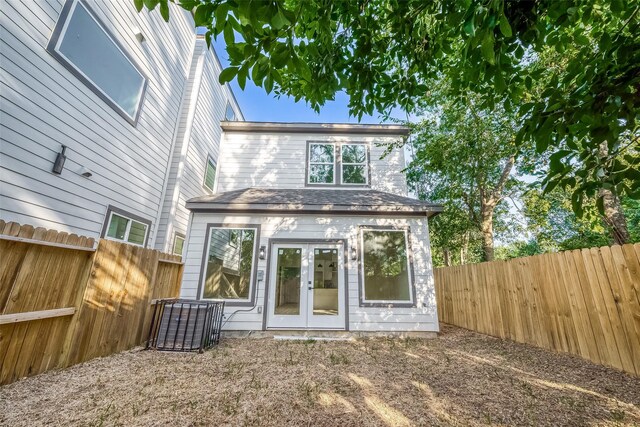 7002 Sidney St, Houston, TX 77021 - back of property with french doors and a fenced backyard