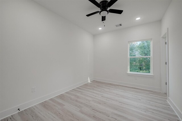 7002 Sidney St, Houston, TX 77021 - unfurnished room featuring recessed lighting, light wood-style floors, baseboards, and ceiling fan