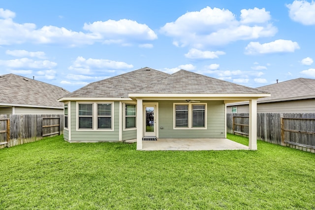 723 Larkspur Shadow Dr, Magnolia, TX 77354 - back of house featuring a patio area and roof with shingles