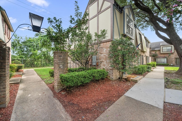 14703 Barryknoll Ln Unit 26, Houston, TX 77079 - view of side of property with brick siding and stucco siding