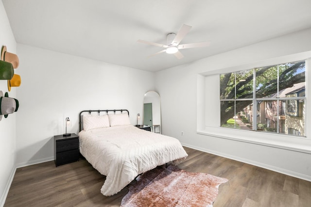 14703 Barryknoll Ln Unit 26, Houston, TX 77079 - bedroom featuring wood finished floors and a ceiling fan