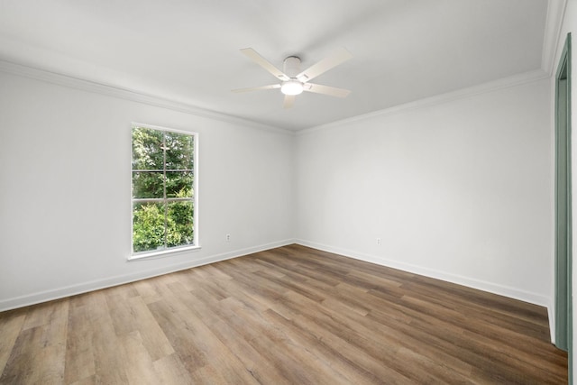 14703 Barryknoll Ln Unit 26, Houston, TX 77079 - spare room featuring wood finished floors, ornamental molding, and ceiling fan