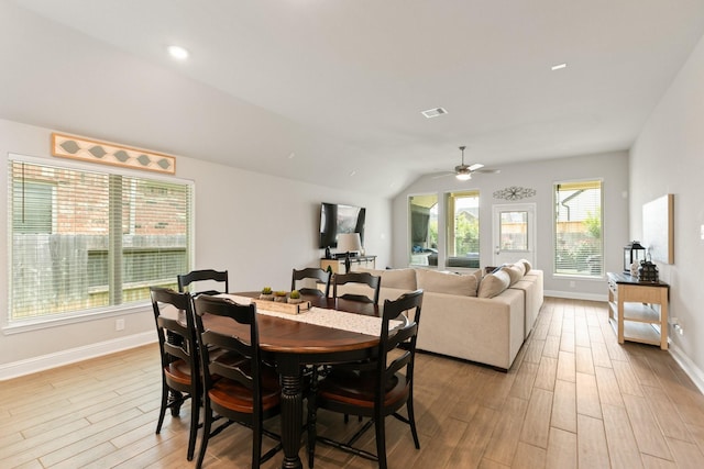 18226 Sofia Willow Way, Cypress, TX 77429 - dining area featuring light wood-style flooring, a ceiling fan, and vaulted ceiling