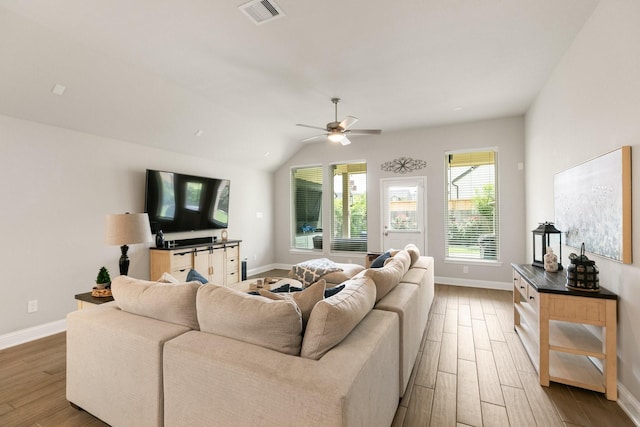 18226 Sofia Willow Way, Cypress, TX 77429 - living room featuring wood finished floors, a ceiling fan, and lofted ceiling