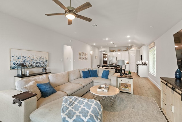 18226 Sofia Willow Way, Cypress, TX 77429 - living area with light wood finished floors, a ceiling fan, recessed lighting, and vaulted ceiling