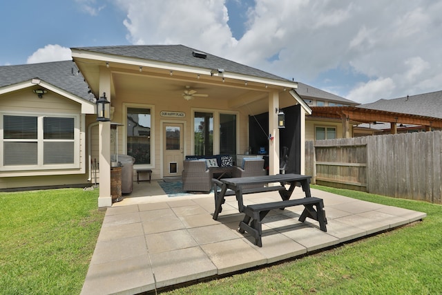 18226 Sofia Willow Way, Cypress, TX 77429 - back of house featuring ceiling fan, a patio, and roof with shingles