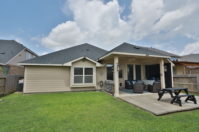 18226 Sofia Willow Way, Cypress, TX 77429 - rear view of property featuring an outdoor hangout area, a fenced backyard, a shingled roof, and a patio