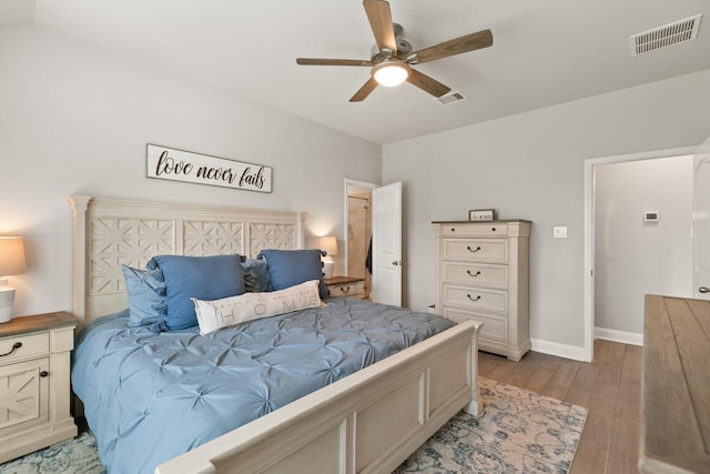 18226 Sofia Willow Way, Cypress, TX 77429 - bedroom with light wood finished floors and a ceiling fan
