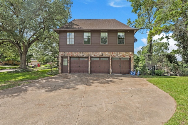 7527 Cart Gate Dr, Houston, TX 77095 - view of side of home with an attached garage, a lawn, and concrete driveway