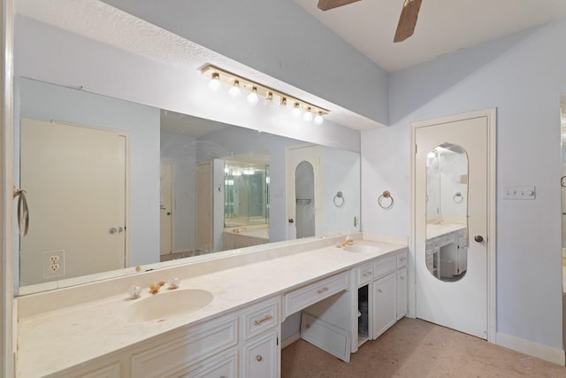 7527 Cart Gate Dr, Houston, TX 77095 - full bathroom with double vanity, ceiling fan, and a shower