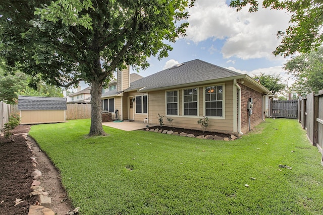 2001 Navajo Dr, Deer Park, TX 77536 - back of property featuring a fenced backyard, a patio, a storage shed, and a chimney