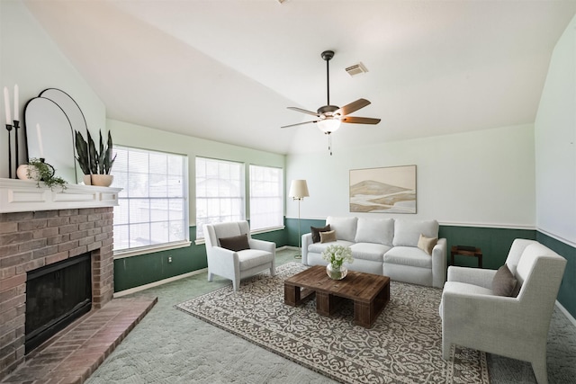 2001 Navajo Dr, Deer Park, TX 77536 - carpeted living area with a ceiling fan and a brick fireplace