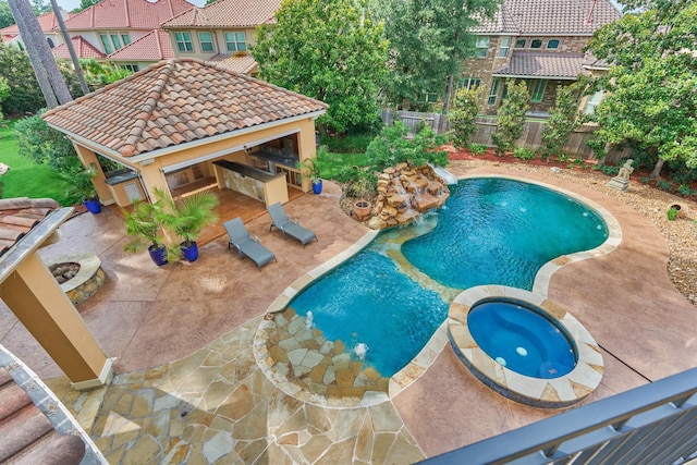 9814 Cape Breeze Dr, Houston, TX 77070 - view of swimming pool featuring a patio area, a fenced backyard, a pool with connected hot tub, and a gazebo
