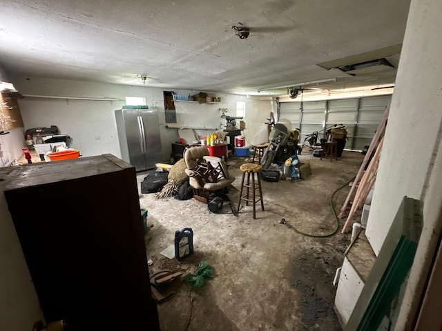 1225 County Road 878b, Sweeny, TX 77480 - garage with freestanding refrigerator