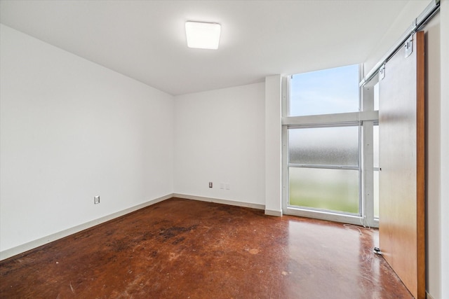 2327 Peckham St, Houston, TX 77019 - empty room with concrete floors and baseboards