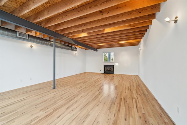 2327 Peckham St, Houston, TX 77019 - below grade area with wood finished floors and a fireplace