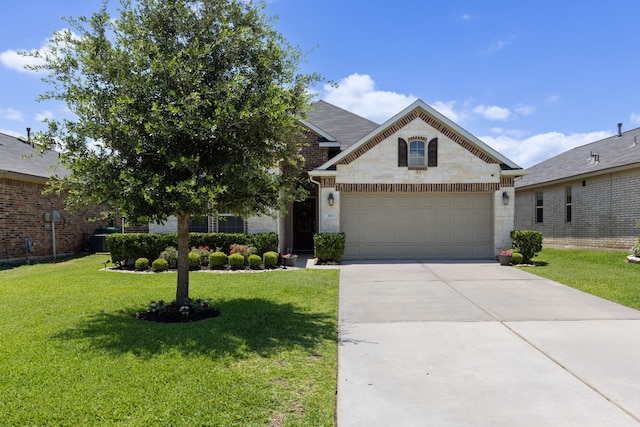 423 Terra Vista Cir, Montgomery, TX 77356 - view of front of house featuring a garage, a front lawn, driveway, cooling unit, and brick siding