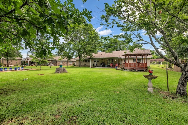 410 Azalea Dr, Baytown, TX 77520 - view of yard featuring a deck