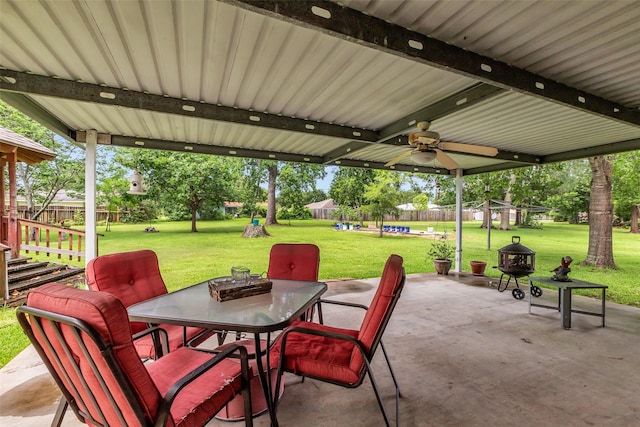 410 Azalea Dr, Baytown, TX 77520 - view of patio featuring outdoor dining area and ceiling fan
