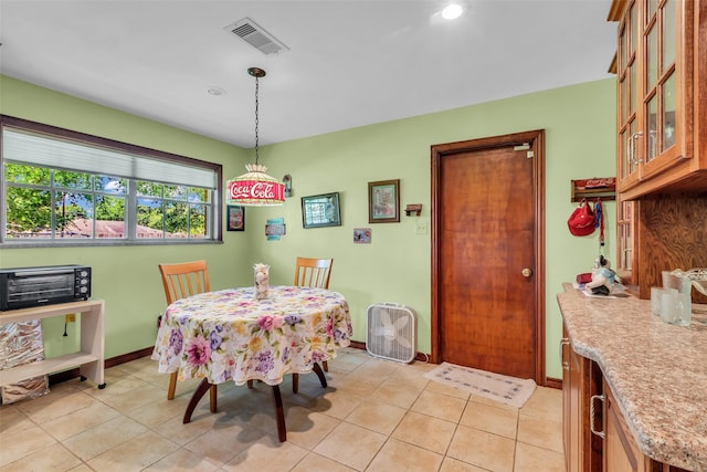 410 Azalea Dr, Baytown, TX 77520 - dining room featuring light tile patterned floors and recessed lighting