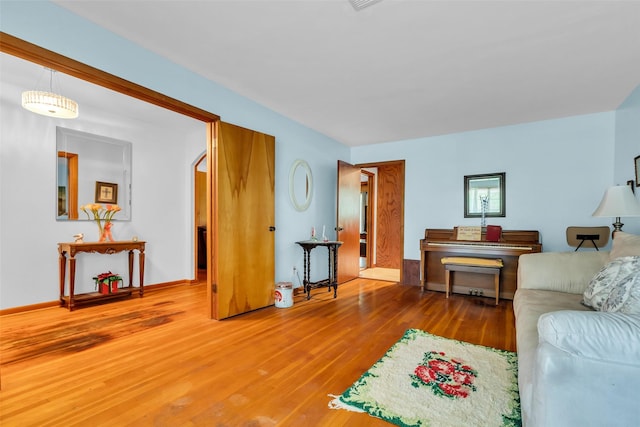 410 Azalea Dr, Baytown, TX 77520 - living room featuring wood finished floors
