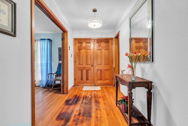 410 Azalea Dr, Baytown, TX 77520 - foyer entrance with wood finished floors and baseboards