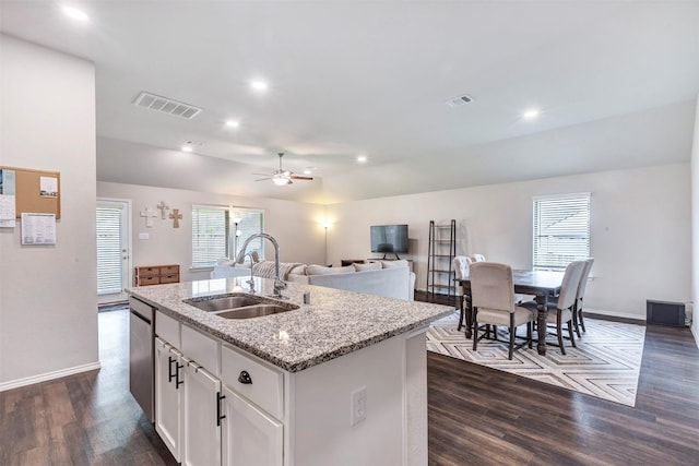 19242 Red Cascade Ct, Tomball, TX 77377 - kitchen featuring a sink, dark wood-style floors, a center island with sink, dishwasher, and recessed lighting