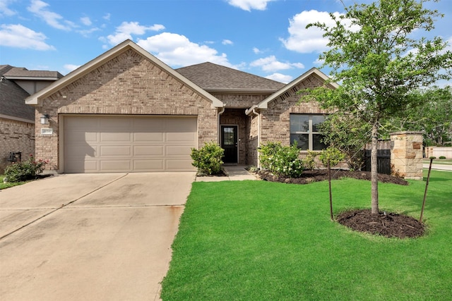 19242 Red Cascade Ct, Tomball, TX 77377 - view of front of property featuring driveway, an attached garage, brick siding, a front yard, and a shingled roof