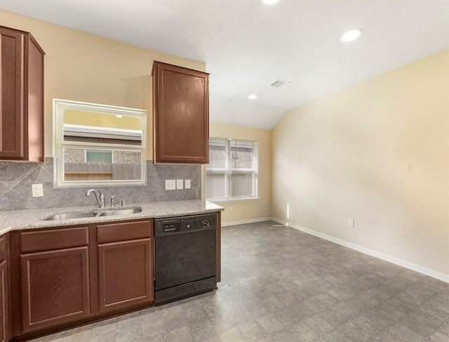 20611 Footstep Path, Katy, TX 77449 - kitchen featuring black dishwasher, a sink, tasteful backsplash, light flooring, and vaulted ceiling
