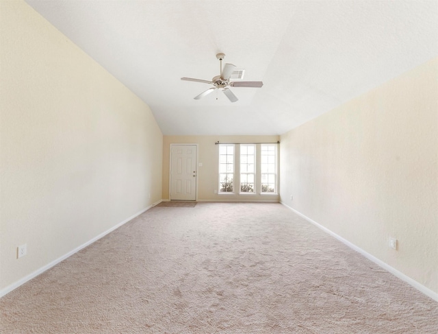 20611 Footstep Path, Katy, TX 77449 - spare room featuring ceiling fan, baseboards, carpet, and vaulted ceiling