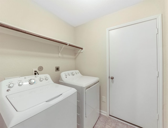 20611 Footstep Path, Katy, TX 77449 - laundry room featuring washing machine and clothes dryer and baseboards