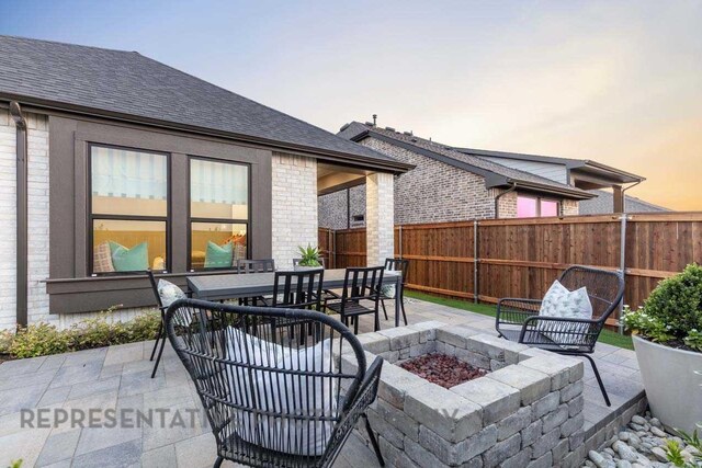 27019 Golden Isle Ln, Katy, TX 77493 - view of patio with an outdoor fire pit and outdoor dining space