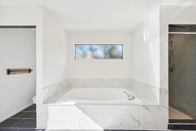 7202 Las Brisas Dr, Houston, TX 77083 - bathroom with toilet, a bath, a shower, and tile patterned flooring