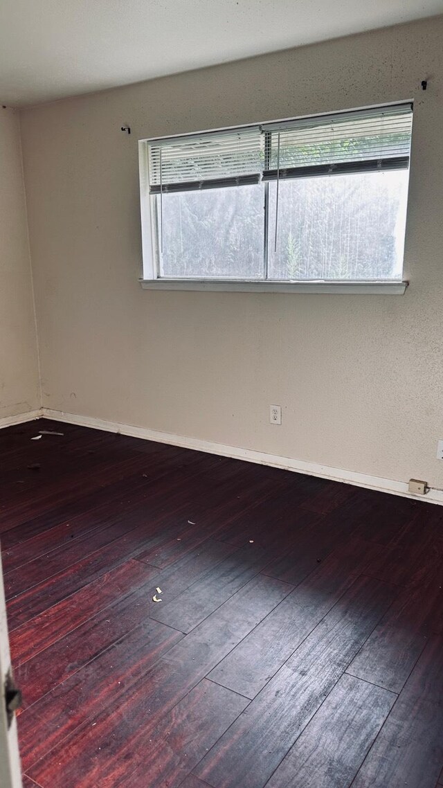 10126 Pine Moss Dr, Houston, TX 77040 - empty room featuring hardwood / wood-style floors and baseboards