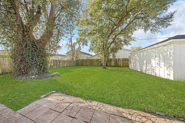 9039 Sandstone St, Houston, TX 77036 - view of yard featuring a patio